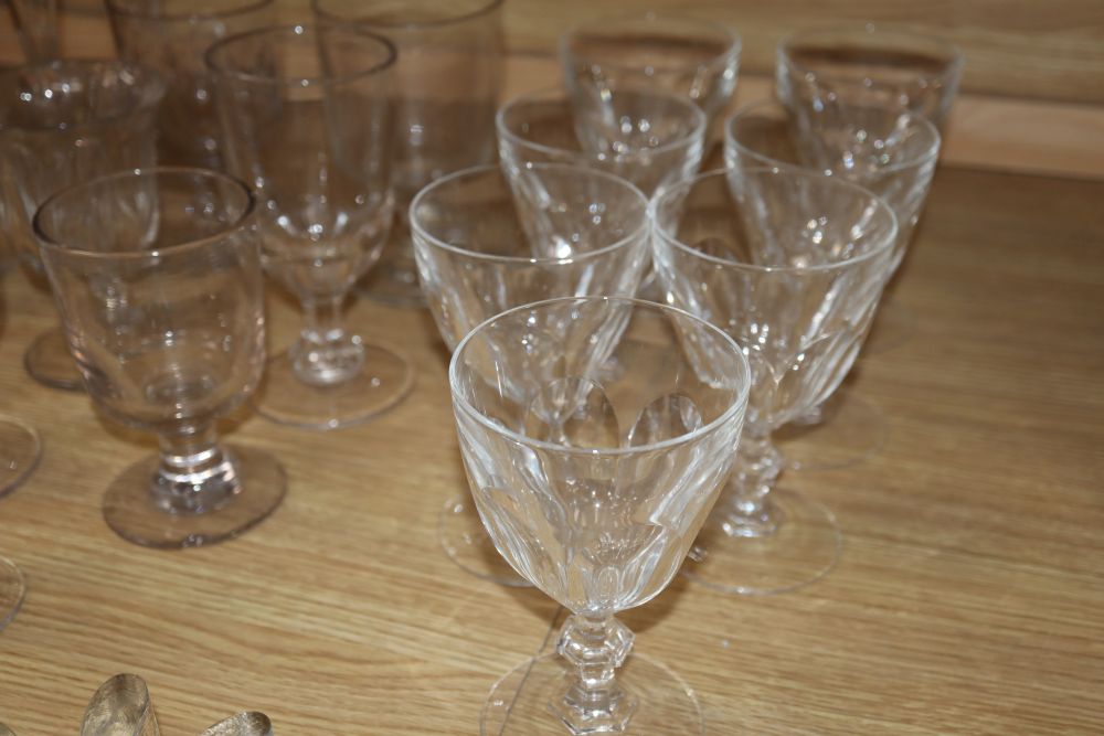 A quantity of glass rummers, flutes, etc.